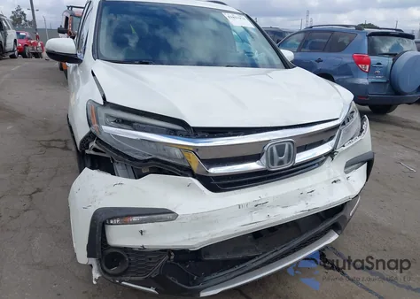 2019 Honda Pilot Touring from USA, damaged, VIN 5FNYF5H65KB019669
